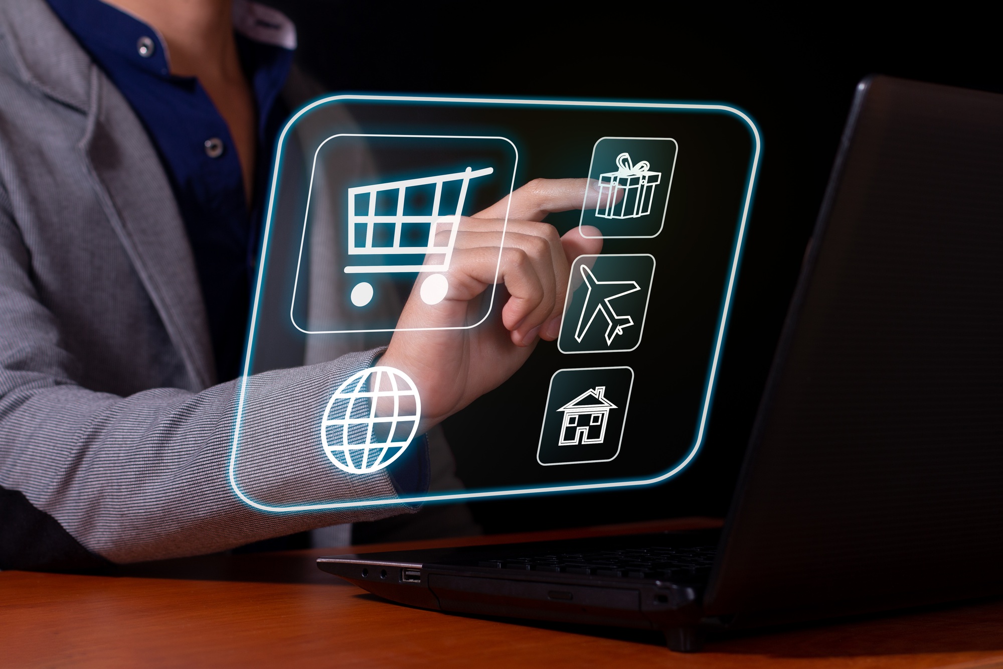 man making a purchase of products in a virtual store from his laptop stores and virtual commerce
